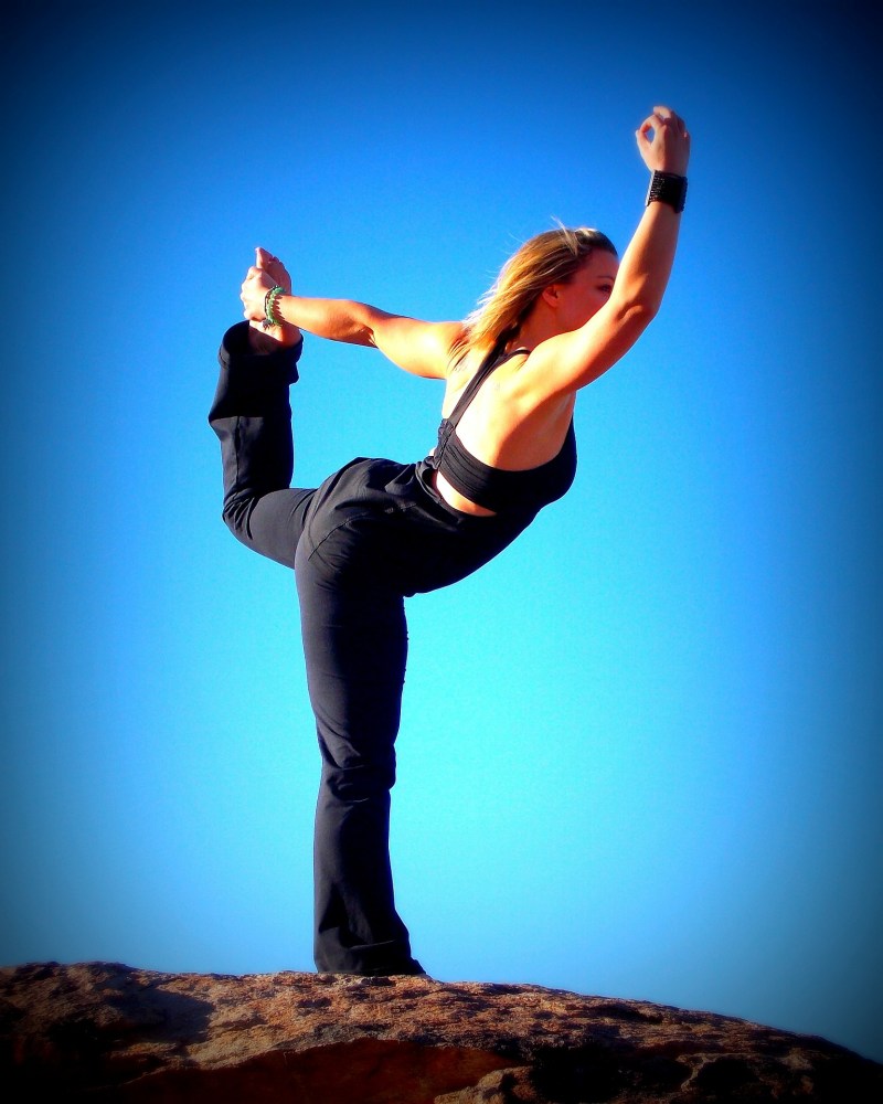 Yoga Pose in front of blue sky