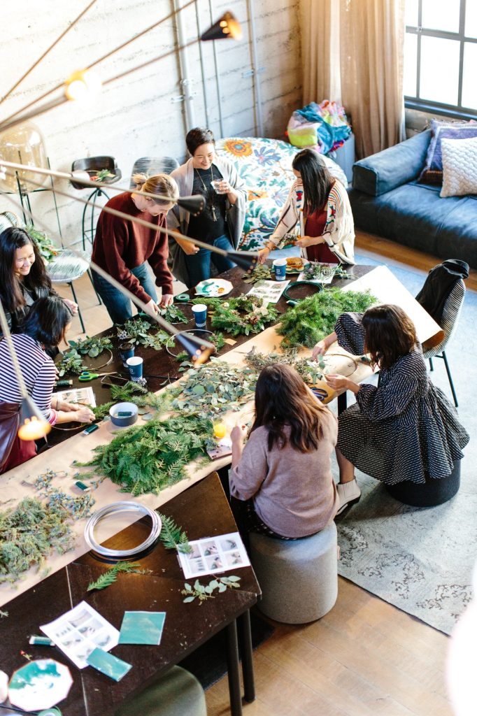 Whistler team building, wreath making workshop with a group of people 